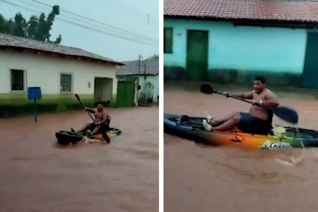 Morador percorre rua alagada de caiaque após chuvas em Caseara